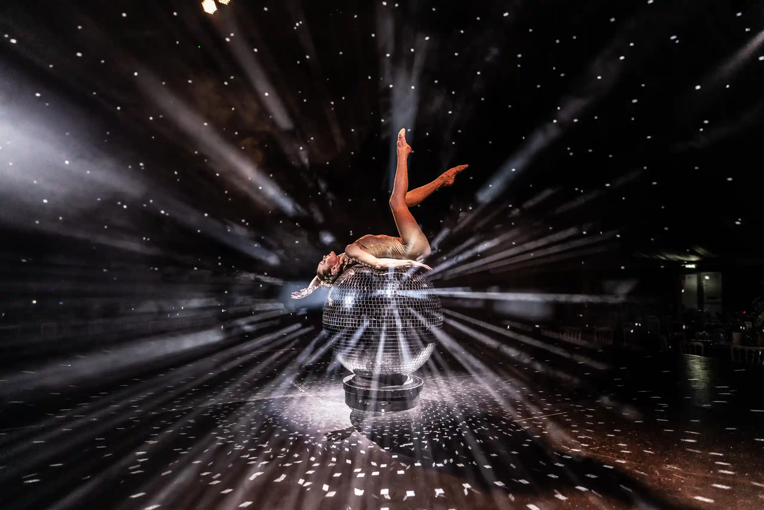 woman dancing on discoball
